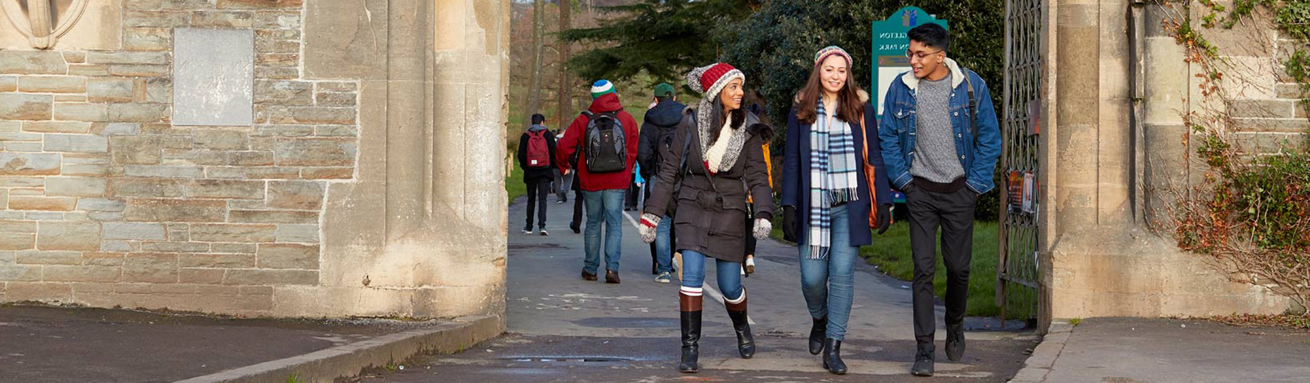 Students in winter clothing walking together