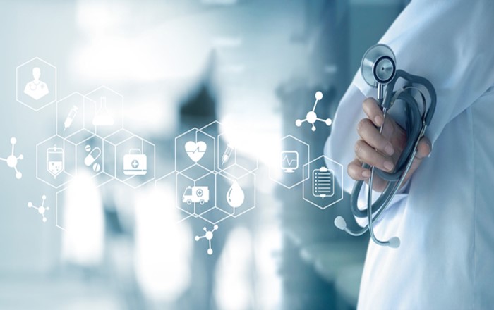 A person holding a stethoscope 