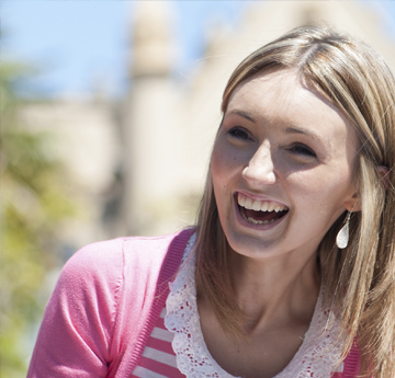 Student outside the Abbey on Singleton Campus