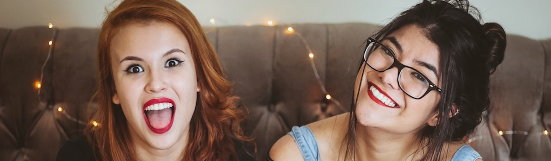 Two female students smiling to the camera