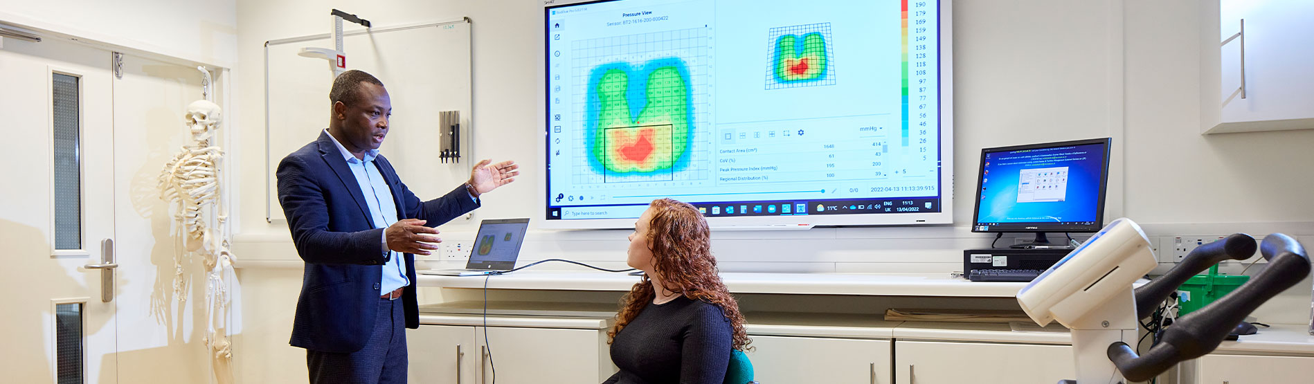A lecturer showing a student a pressure heat diagram.