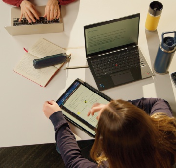 An image of two students studying in Taliesin Create on Singleton Campus. 