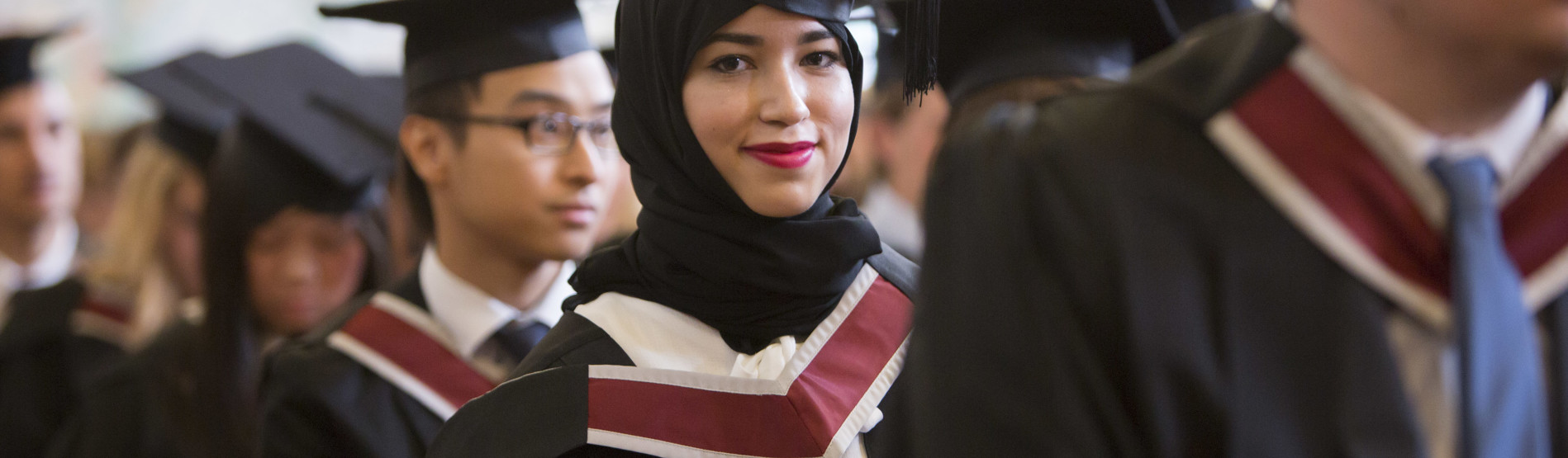 Girl at Graduation in row 