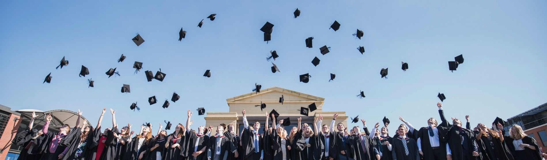 Graduates on the beach