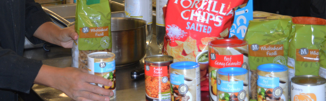 A woman sorting food for reuse