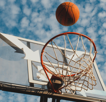 Basketball going through hoop