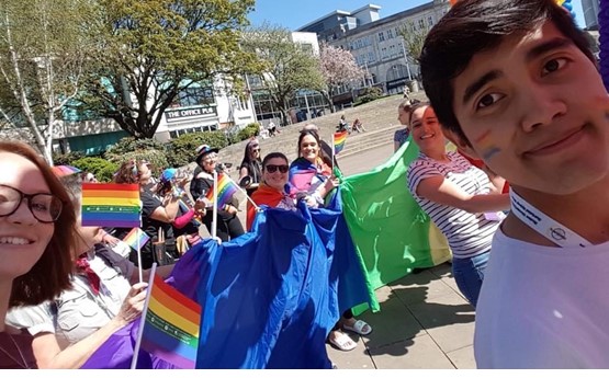 Discovery Volunteers taking part in a pride march