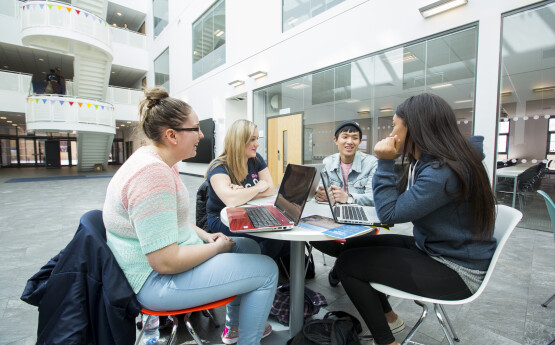 Students studying on Bay Camus