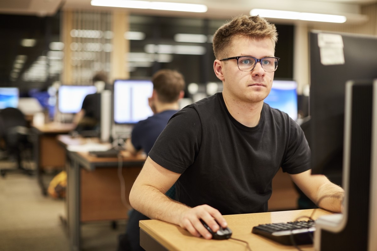 Student using PC. 