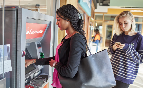 Students at a ATM