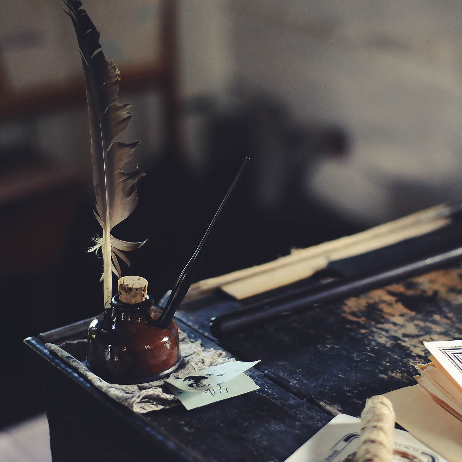 A bottle of ink on a desk