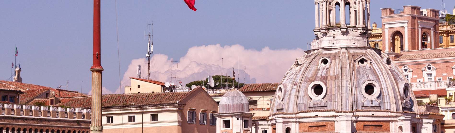 An image of a street in Italy and the Italian flag