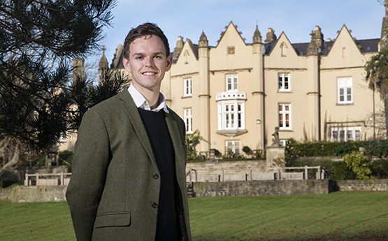 Sam Blaxland stood in front of the Abbey