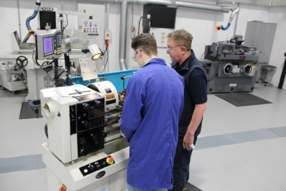 An image of a student in a Mechanical Engineering lab.