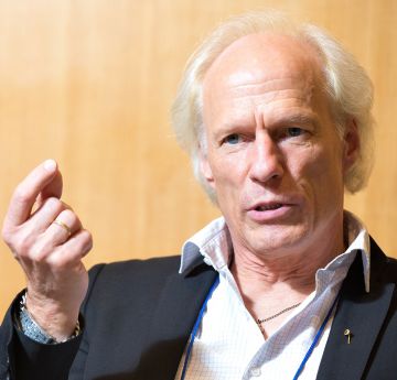 Man making a speech at a conference
