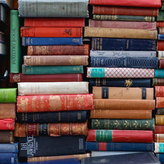 Image of a books stacked on top of each other