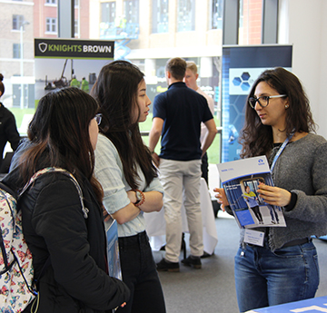 Students talking at careers fair