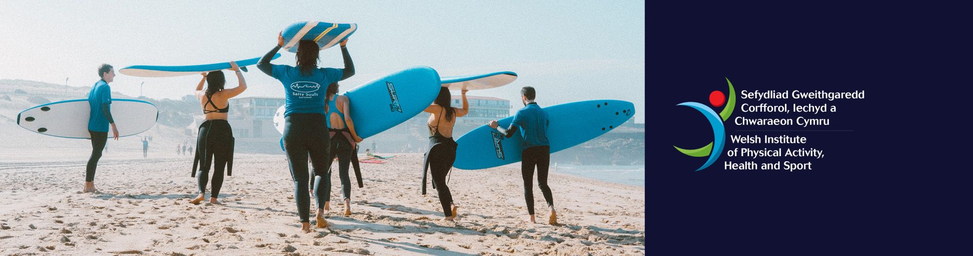 surfers on beach