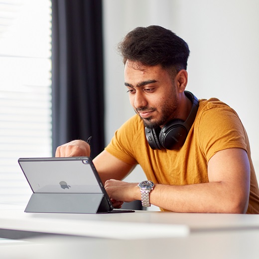 Male student with laptop