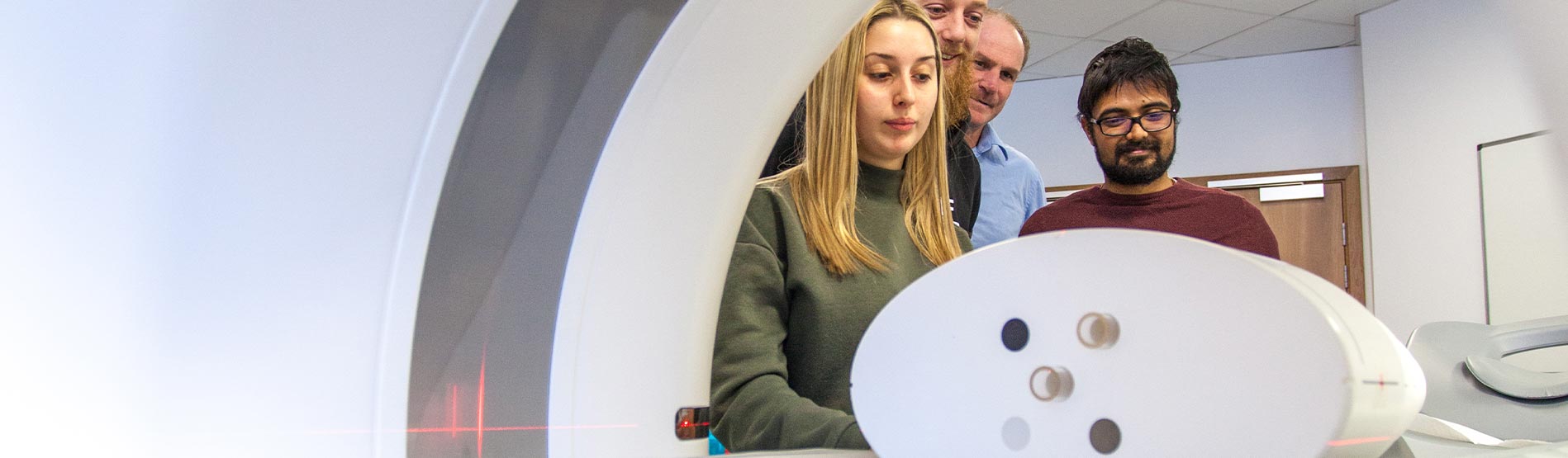 Students Using MRI Scanner