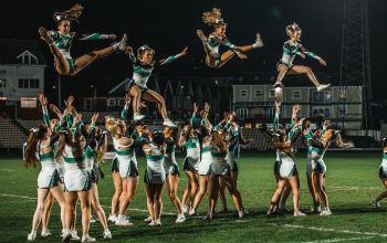 Swansea University's cheerleading squad during a half time rugby performance 