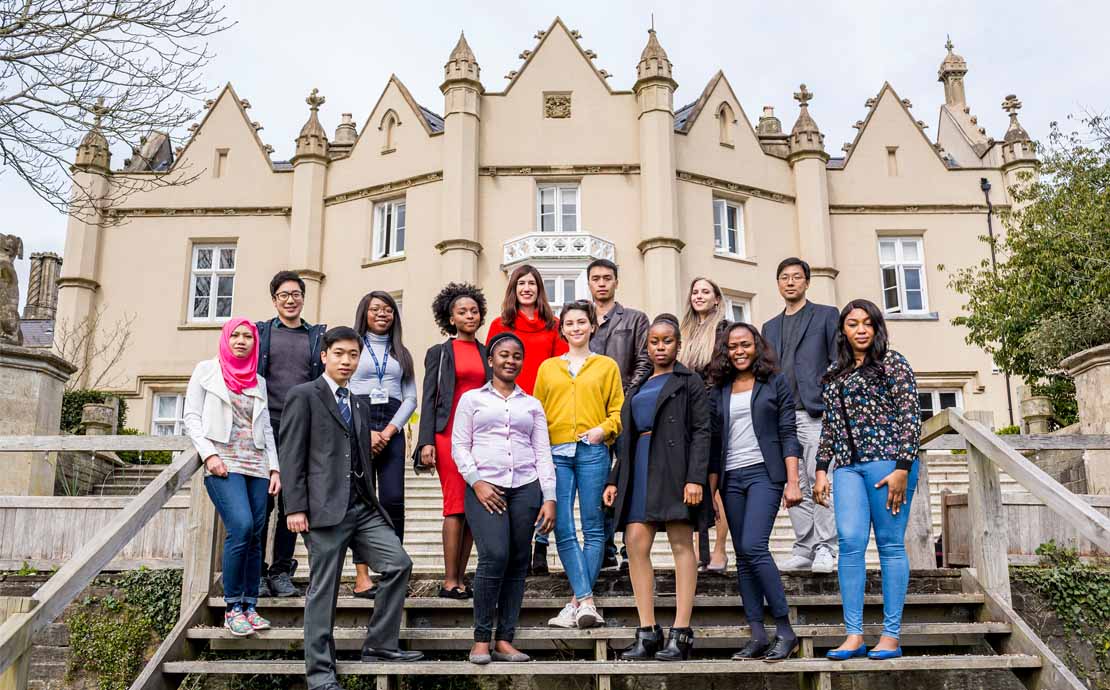 A group of students outside the Singleton Abbey