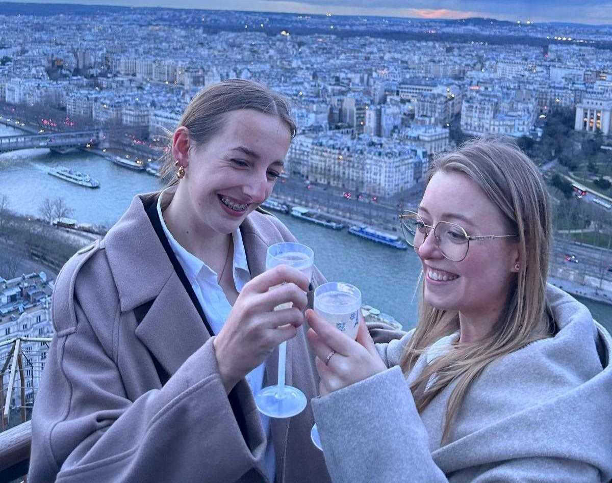 Two students celebrating in Paris