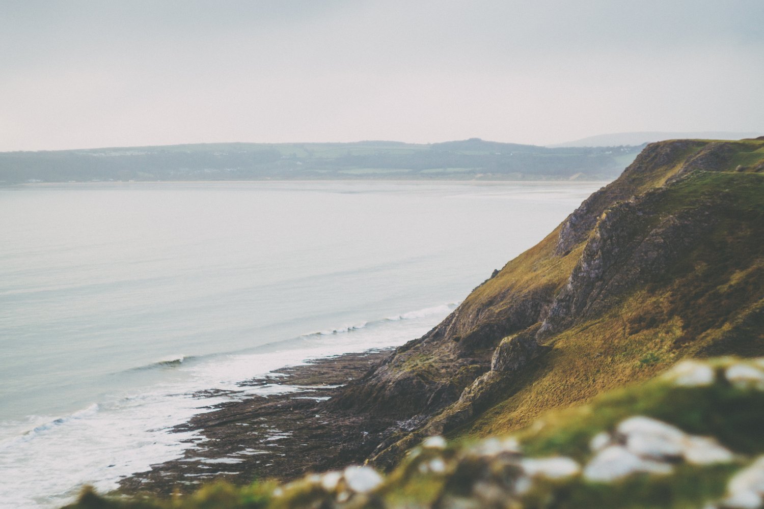 cliff with beach n background