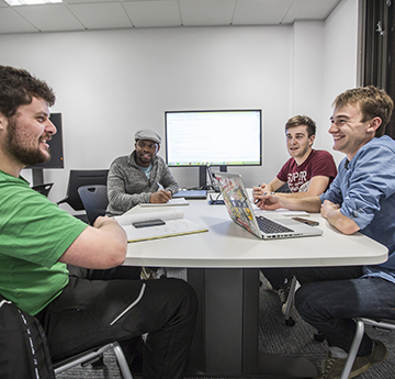 Group of students discussing project