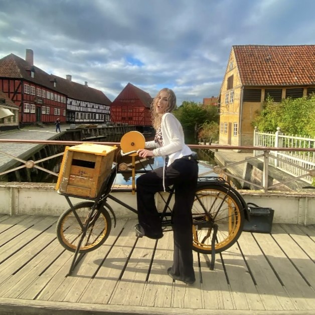 Leah riding on a bike at Aarhus