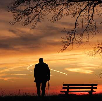 Man standing next to a tree 