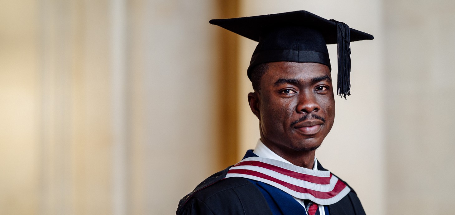 person in graduation gown