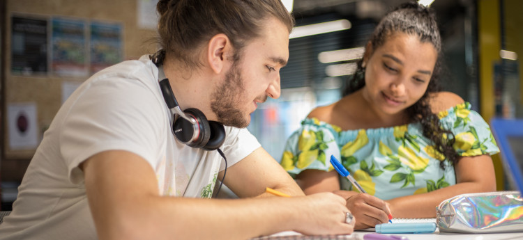 girl and boy studying together