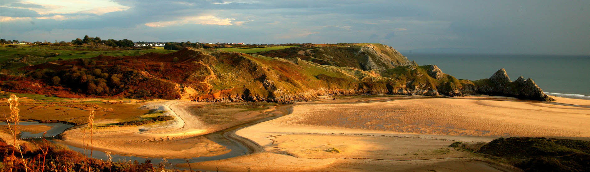 A panorama of three cliffs bay