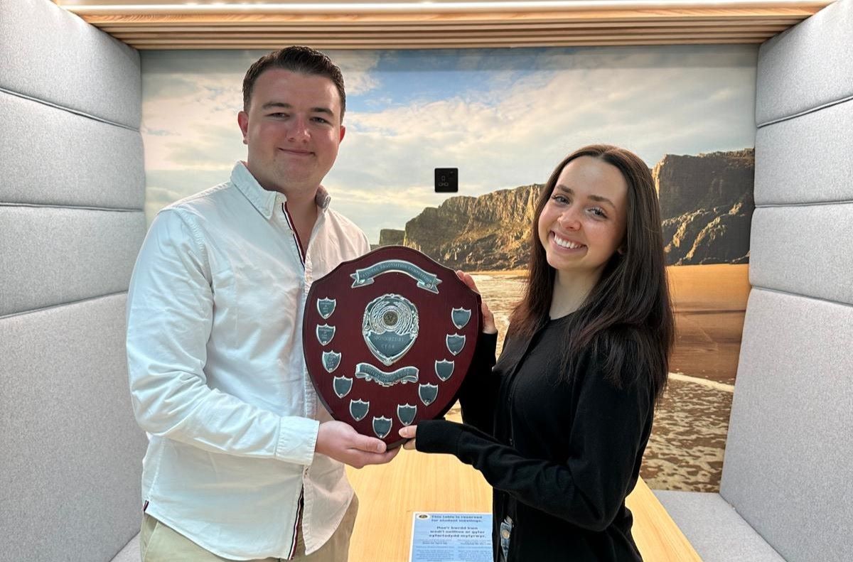Student with trophy