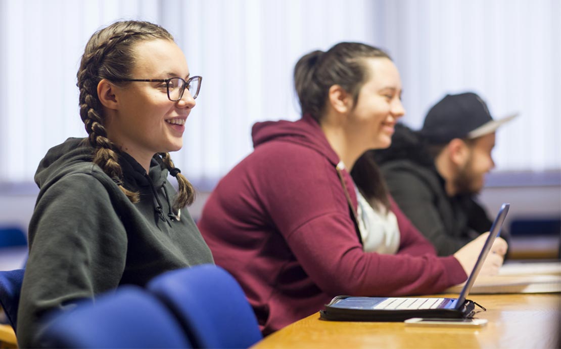 students in classroom listening to a lecture