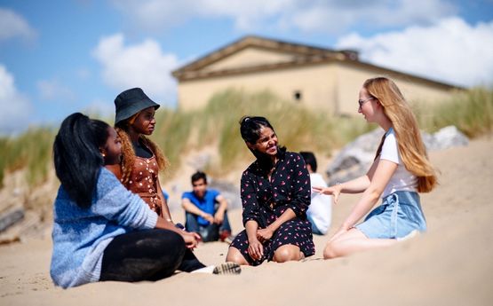 Students at the beach
