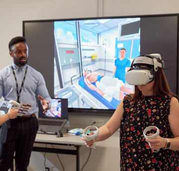 An image of a person using a VR headset.