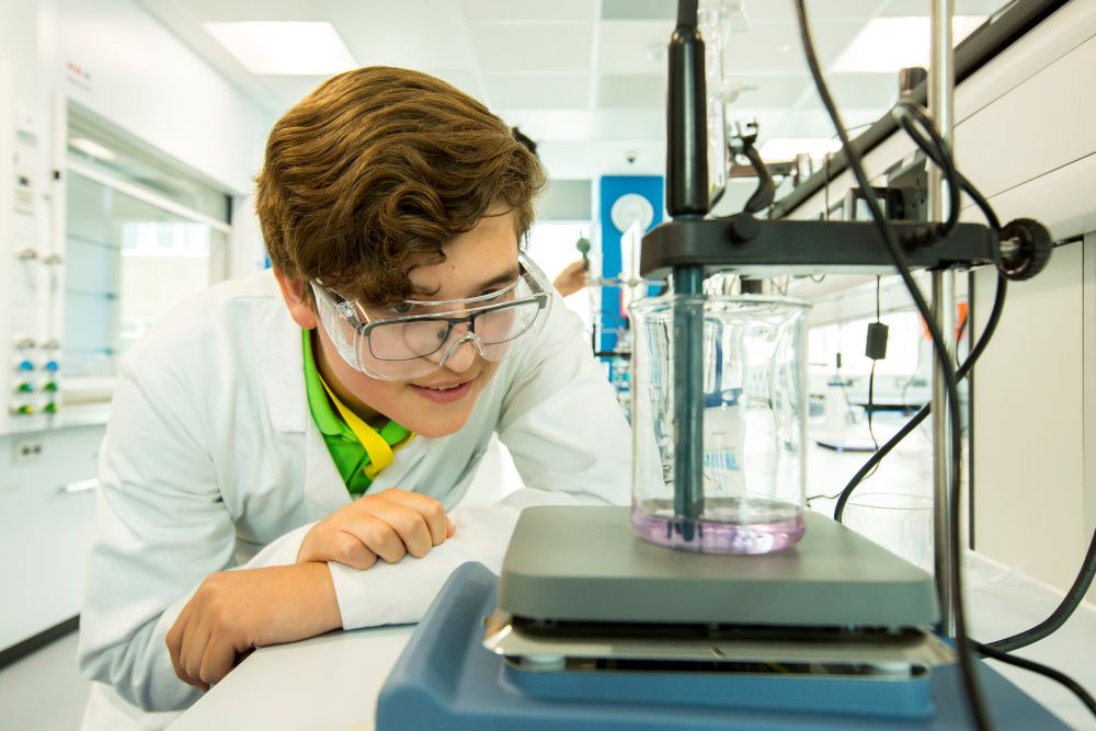 An image of a student in a laboratory. 