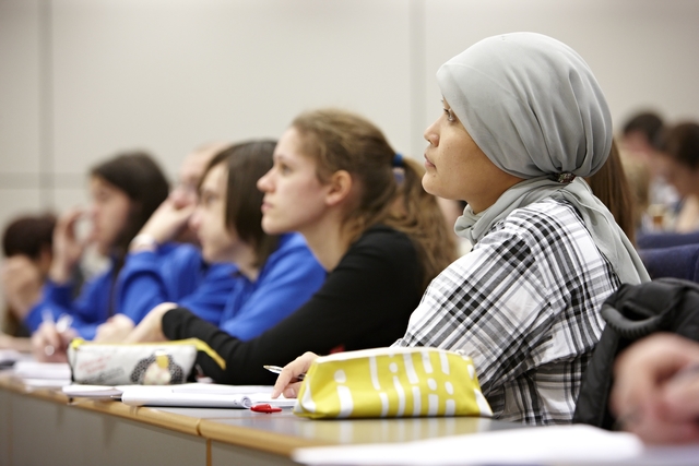 Female Maths students in a lecture theatre