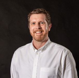 A headshot image of keynote speaker, Professor Tom Crick