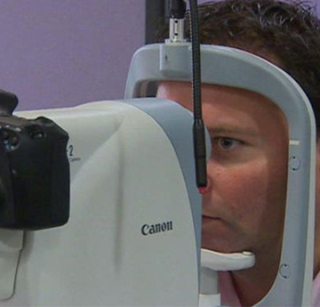 Man getting eye photographed