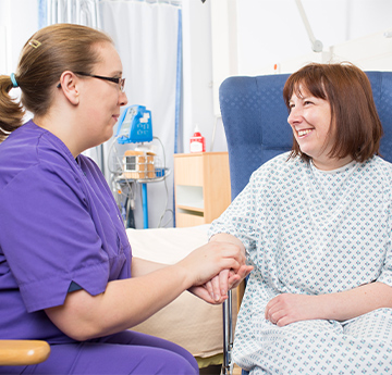 Student talking to patient