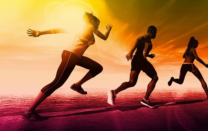A photo of three athletes running.
