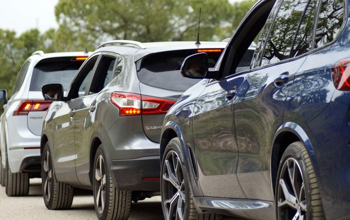 SUVs in traffic