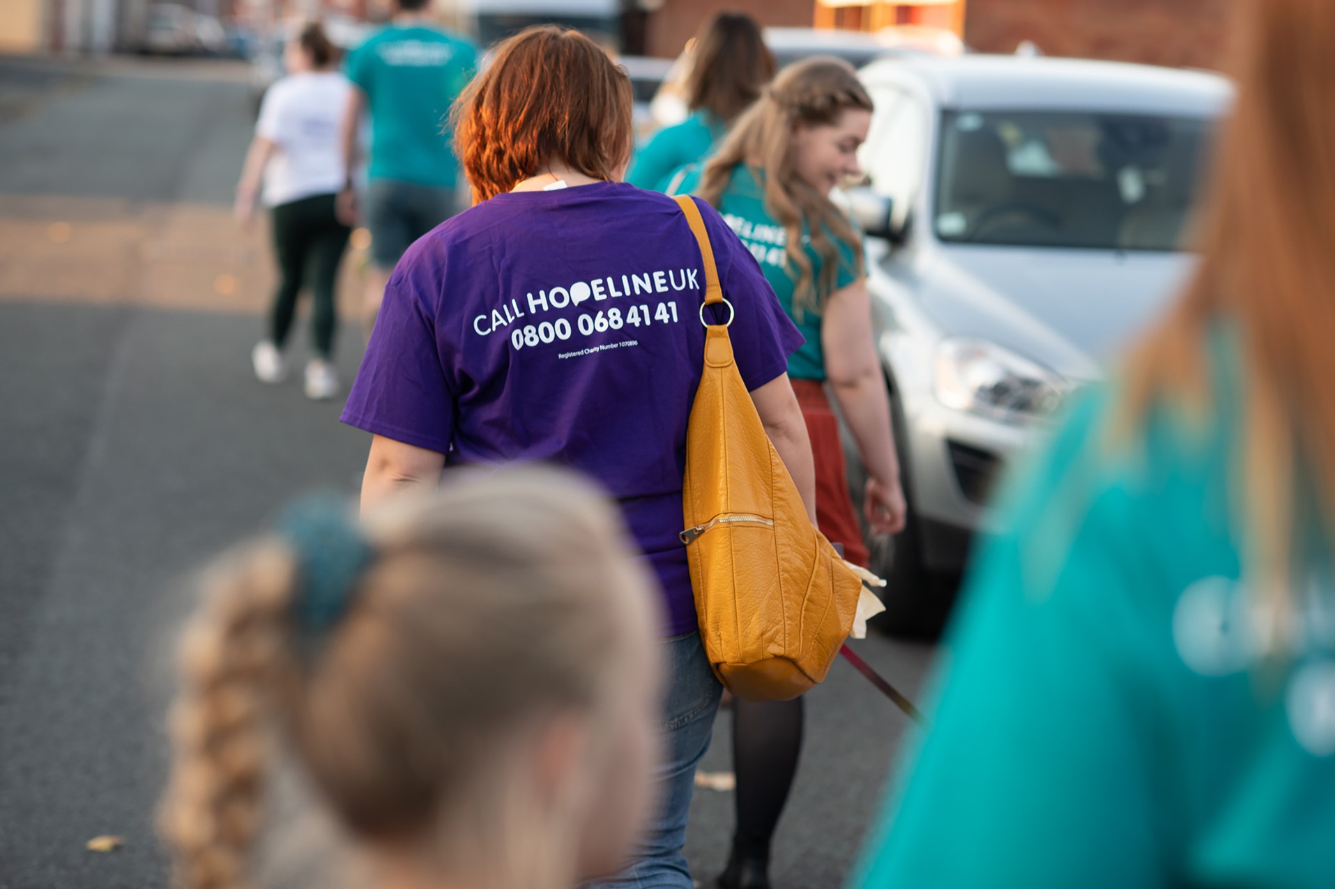 Woman taking part in Hopewalk to raise awareness of young people and suicide