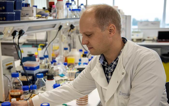 Researcher Remi Zallot working in a laboratory at the Medical School 