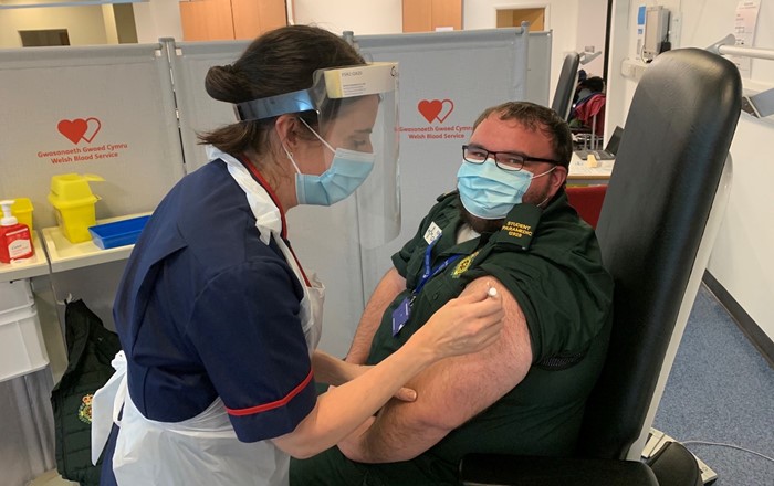 Paramedic students vaccinated as they continue to help support services. First year BSc Paramedic Science student Craig Brown getting his vaccination.