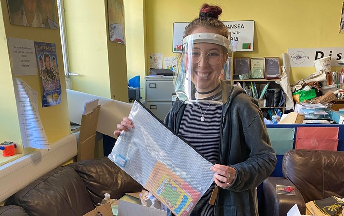 A student volunteer with one of the packs that went out to the local community