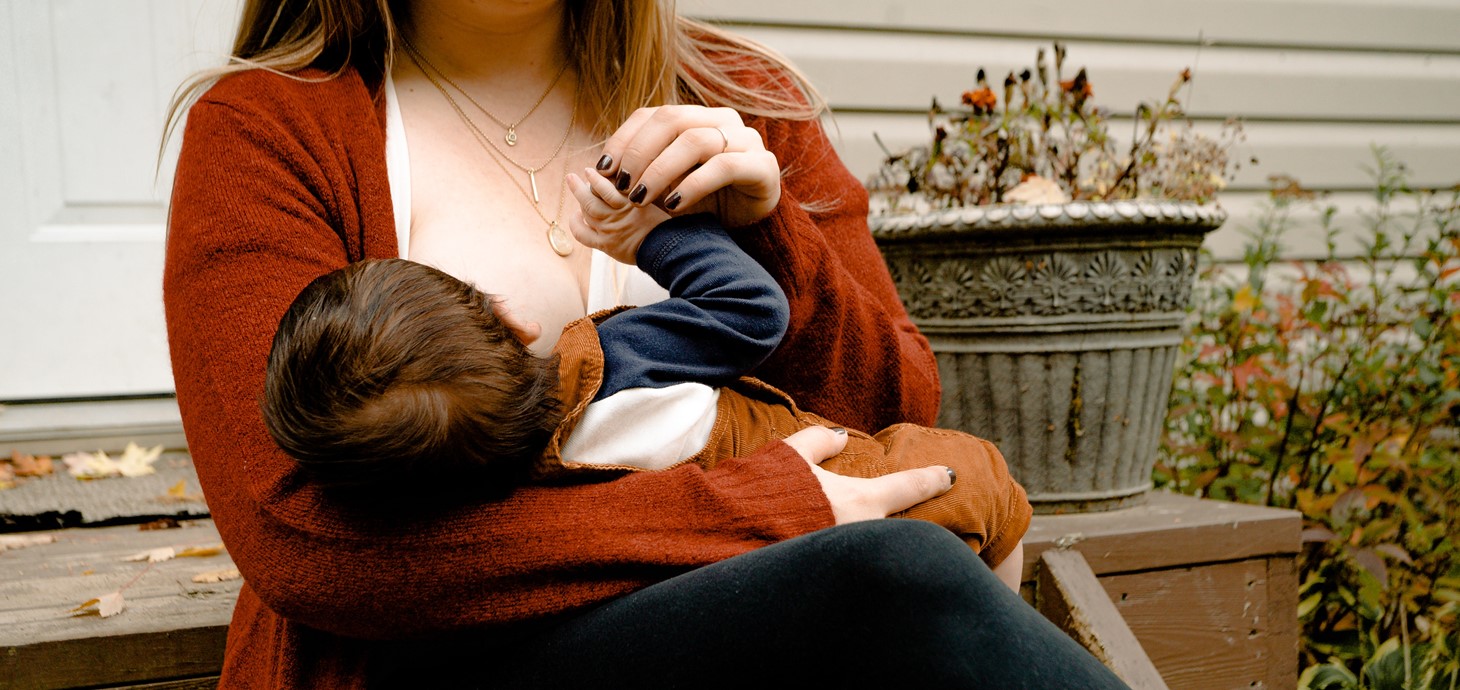 Baby being breastfed. 